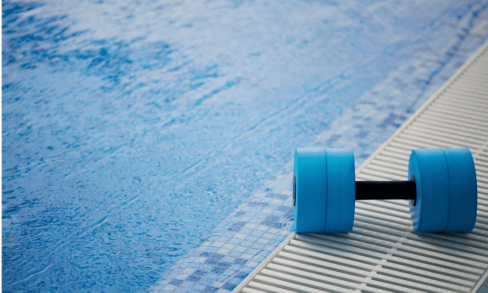 Aqua fit weight sitting next to the pool