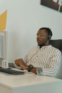 man at desk while working