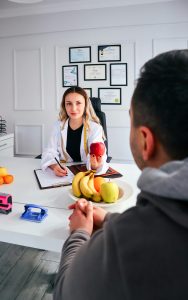 man has a consultation with a dietitian